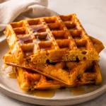 Pumpkin Waffles with warm pumpkin color and a freshly prepared texture